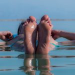 man floating in the dead sea