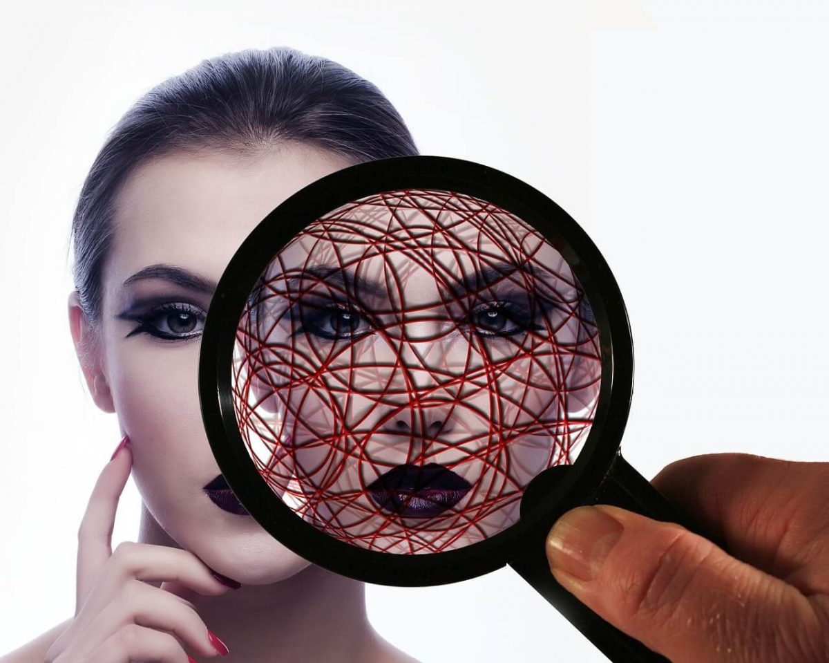 woman with magnifying glass