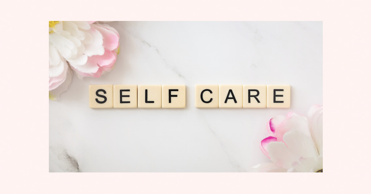 scrabble pieces spell self care