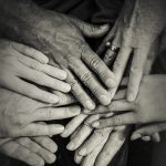 hands coming together