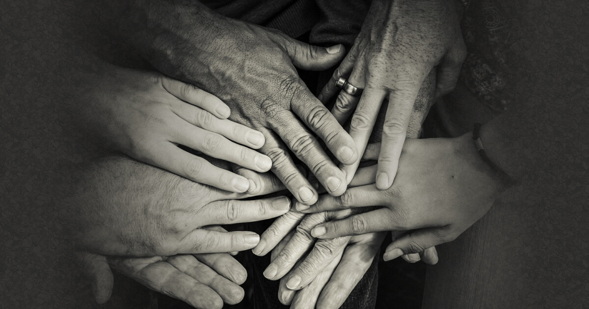 hands coming together